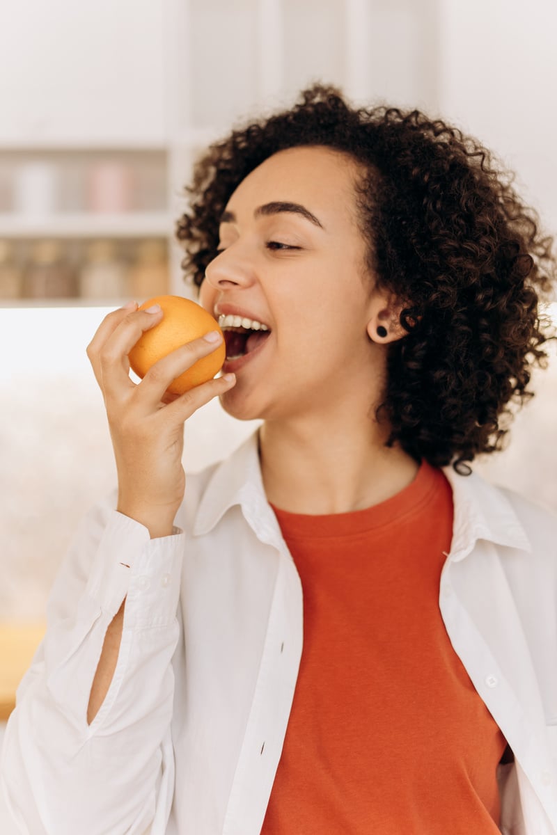 Close-up Photo of Woman Eating Healthy